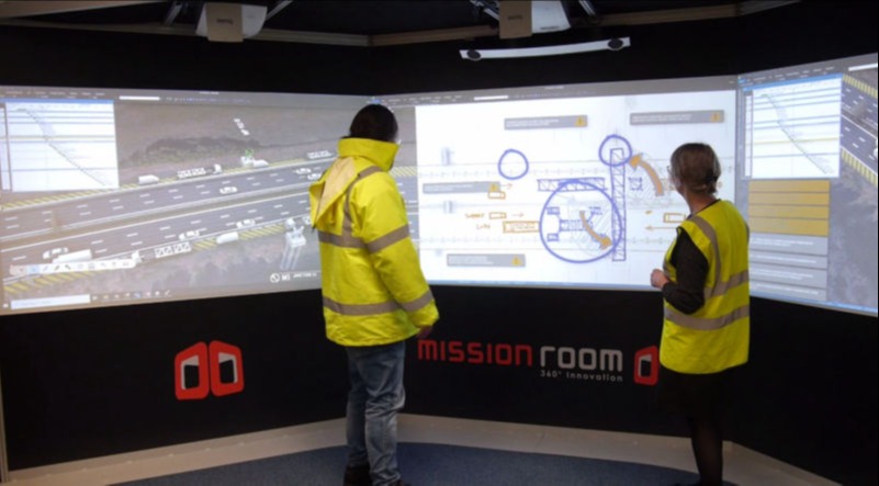 Two people visualising project data on a Cine system