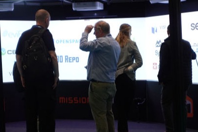 Group of people looking at a Cine system