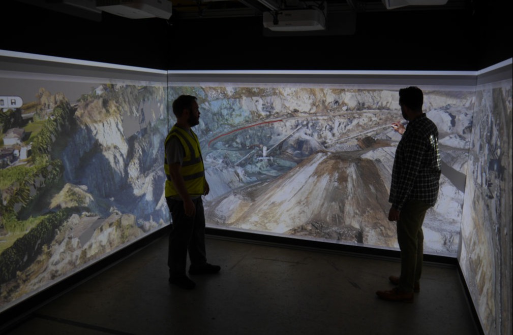 Two people in a Cube system