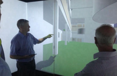 People reviewing a design project in a Cube system